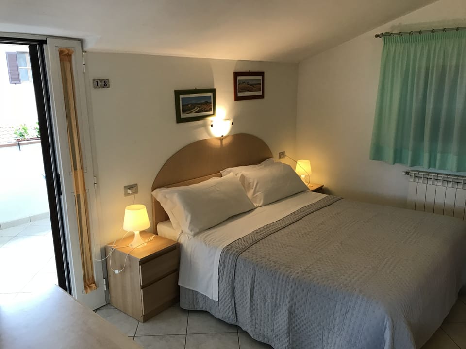 Standard Double Room | Minibar, desk, iron/ironing board, rollaway beds