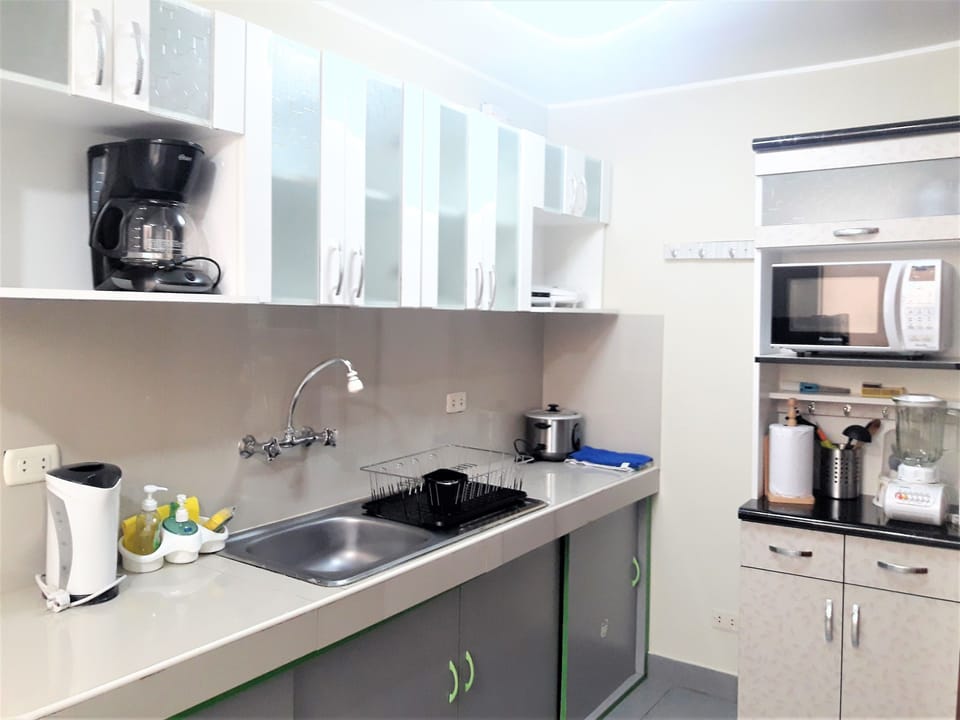 Superior Apartment, 2 Bedrooms | Private kitchen | Full-size fridge, microwave, oven, stovetop
