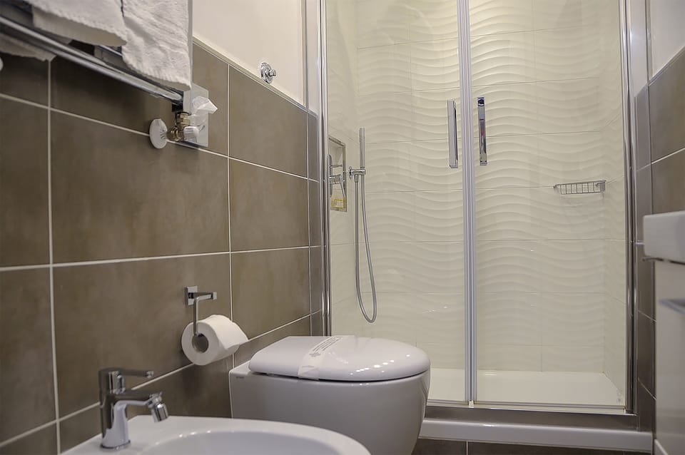 Double Room, Private Bathroom (#5 Sport) | Bathroom | Shower, free toiletries, hair dryer, slippers