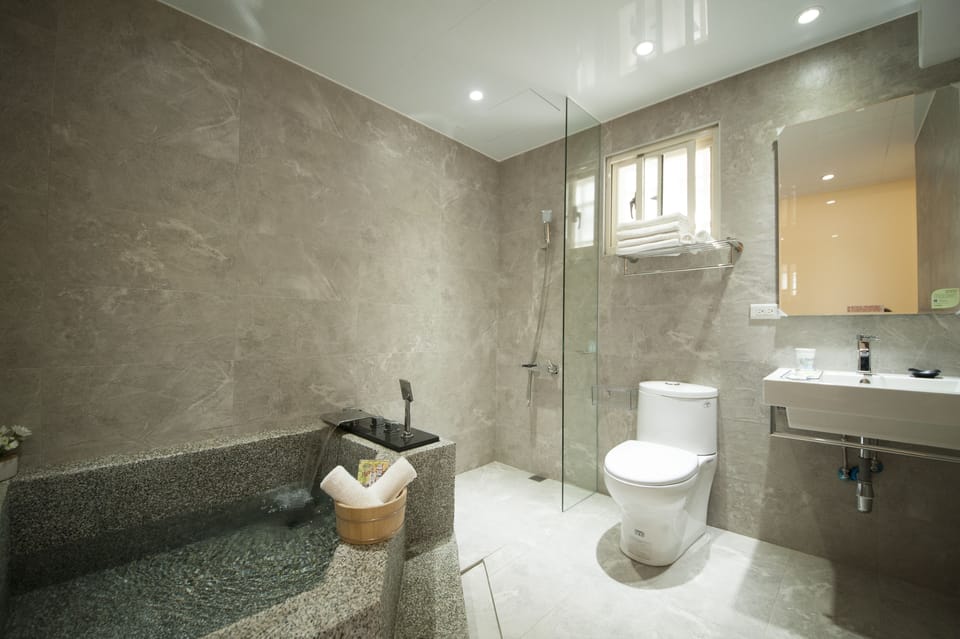 Deluxe Quadruple Room, Multiple Beds, Bathtub | Bathroom | Shower, free toiletries, hair dryer, slippers