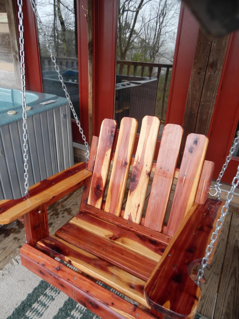 Red Cedar swing on front porch-Made by Wayne Bridges