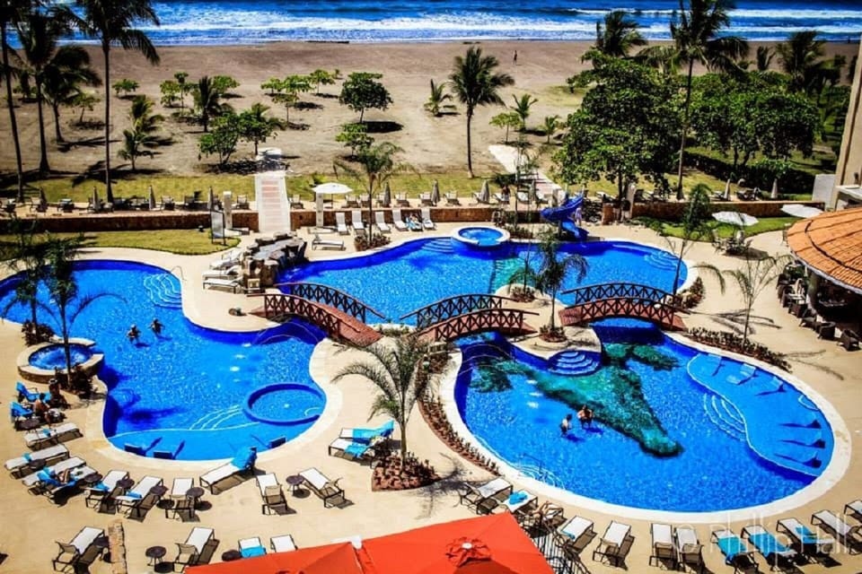 Crocs resort pool, plus another beachside pool in front of the Palms, kids pool