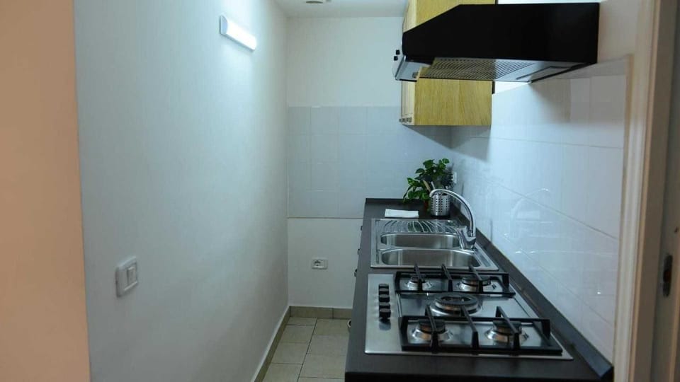 Standard Quadruple Room, Balcony | Private kitchenette | Fridge, oven, stovetop, cookware/dishes/utensils