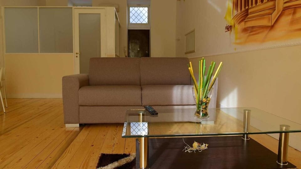Deluxe Apartment, Balcony | Living area | Flat-screen TV