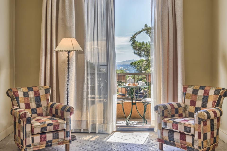 Twin Room, Partial Sea View | In-room safe, desk, blackout drapes, free WiFi
