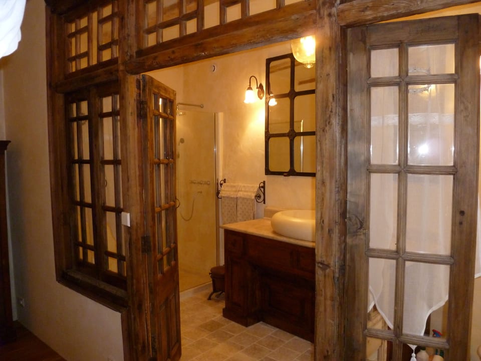 Bathroom | Shower, free toiletries, hair dryer, bathrobes