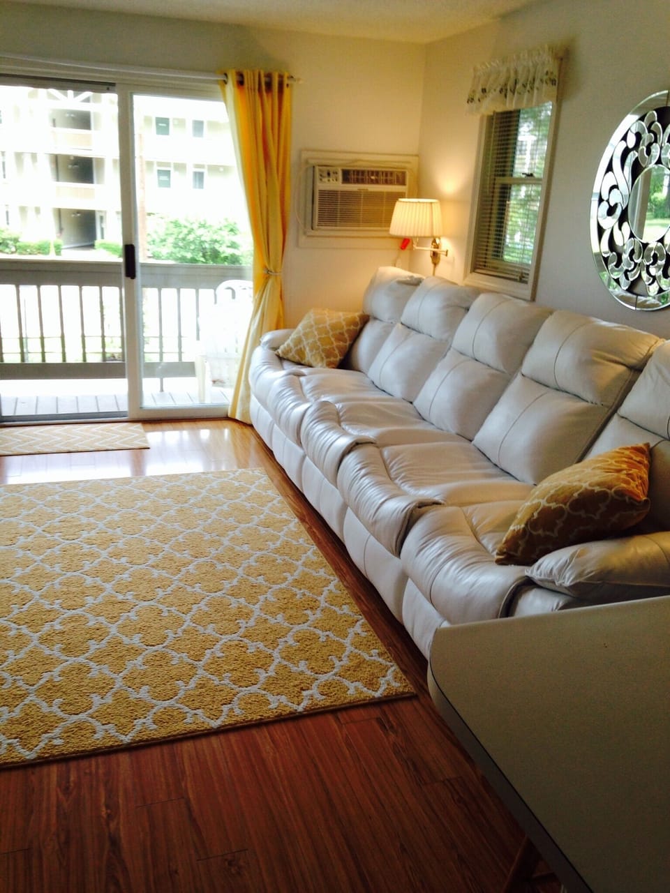 Pull-out queen-size bed with two recliners.