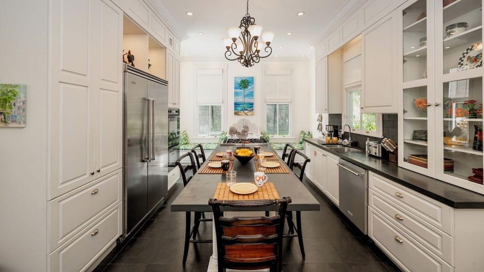 The kitchen bar seating is perfect for a quick bite or keeping the cooks company...