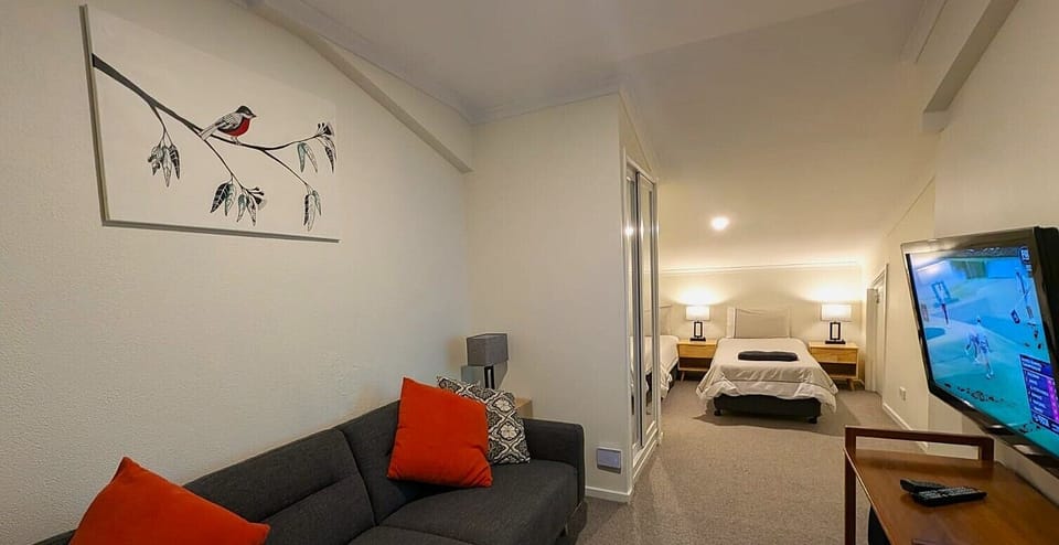 10 Share Superior Deluxe 3 Bedroom | Living area | 50-inch Smart TV with satellite channels