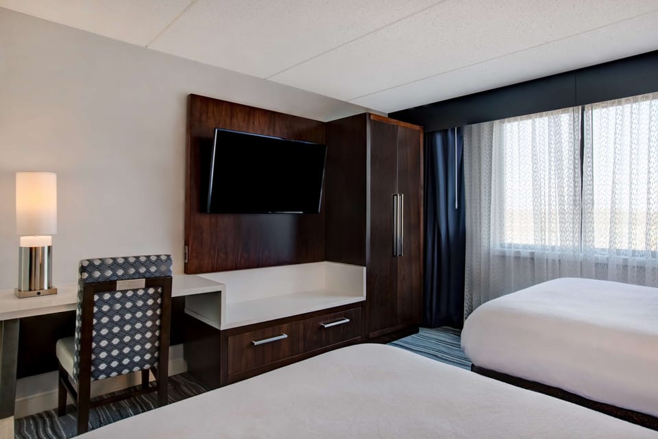 2 Doubles Suite, Non Smoking | In-room safe, desk, laptop workspace, blackout drapes