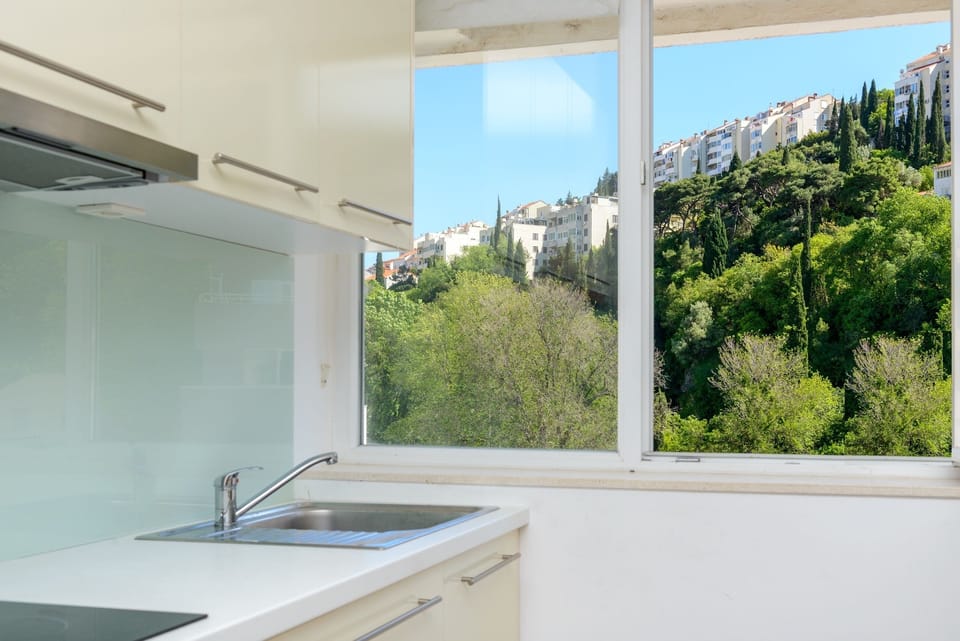 Comfort Studio | Private kitchenette | Full-size fridge, stovetop, electric kettle, cookware/dishes/utensils
