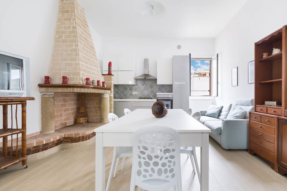 Comfort Apartment, 2 Bedrooms | Living area | Flat-screen TV, fireplace