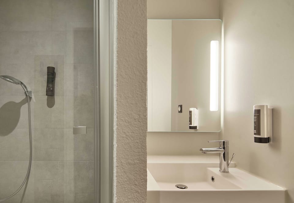 Shower, towels, soap, shampoo