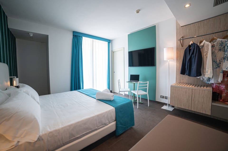 Deluxe Double Room, Balcony | Down comforters, minibar, in-room safe, blackout drapes