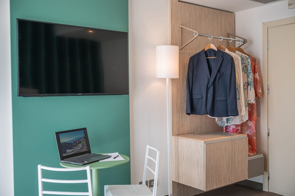 Deluxe Double Room, Balcony | Down comforters, minibar, in-room safe, blackout drapes