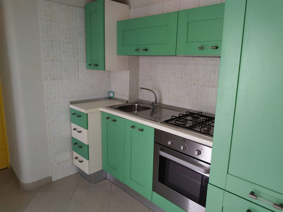 Standard Quadruple Room, 1 Bedroom | In-room safe, desk, free WiFi, bed sheets