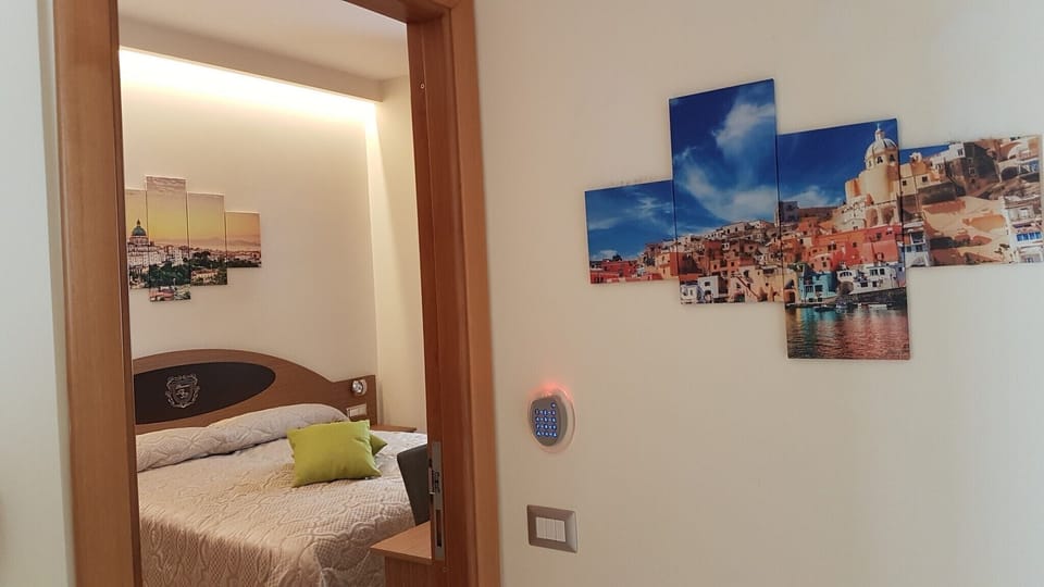 Standard Quadruple Room | In-room safe, desk, WiFi (free), bed sheets