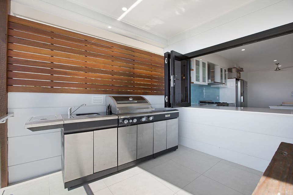 Outdoor dining and kitchen