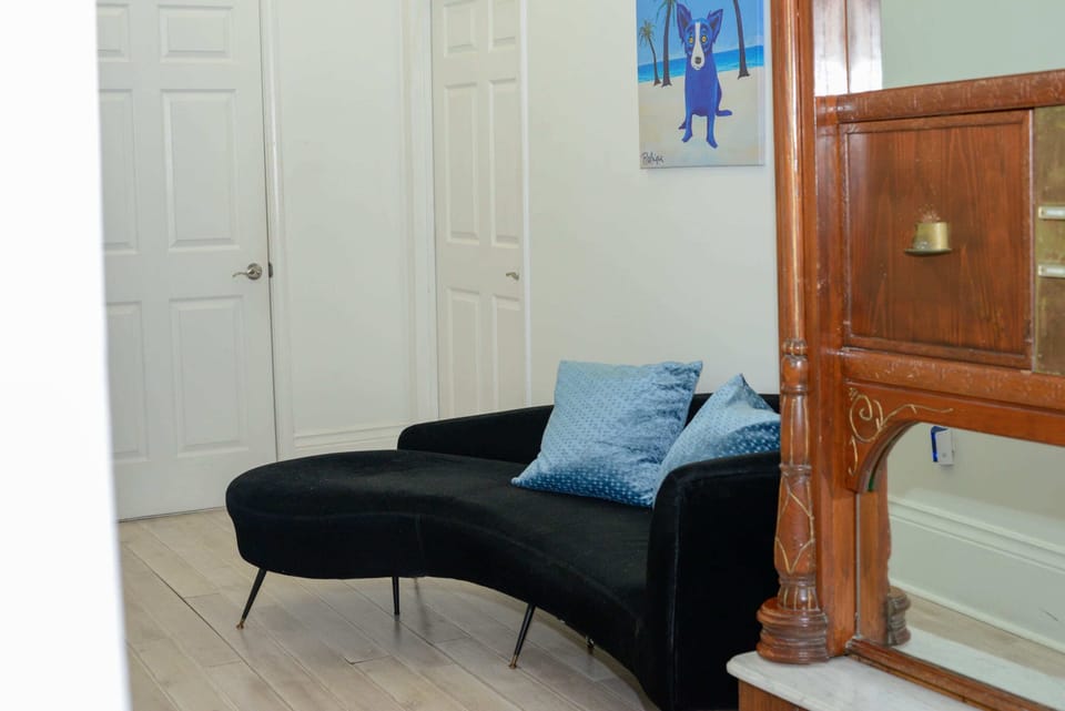 Perfect comfort and adorable art—your ideal cozy spot awaits.