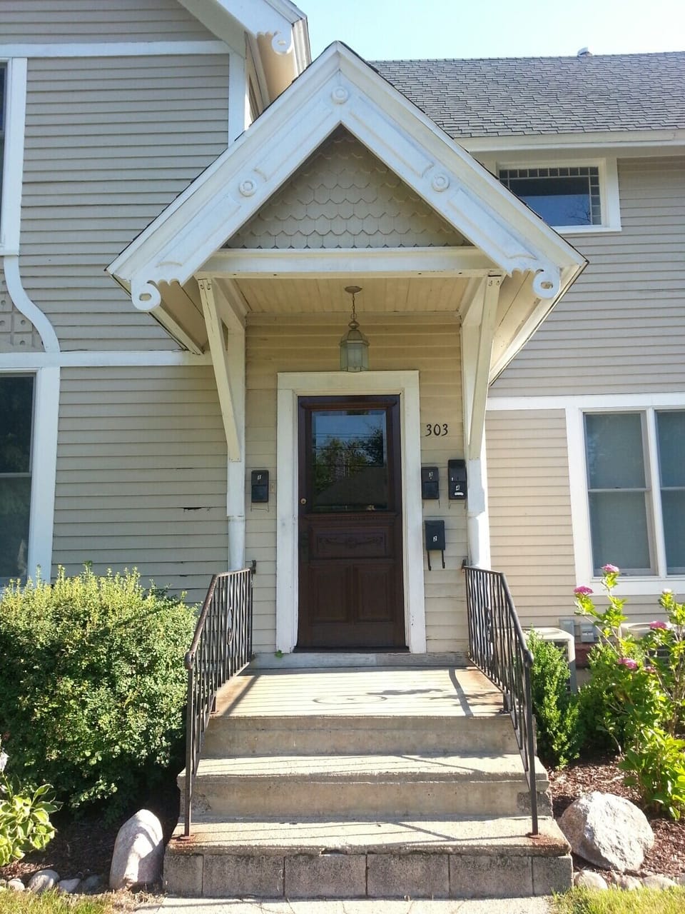Vintage Victorian details have been preserved of the exterior front entry.