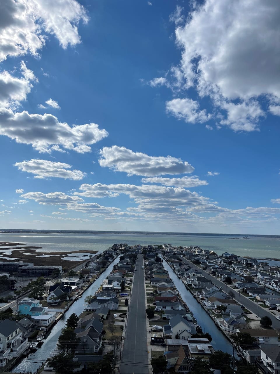 BAY VIEW THRU THE ENTRY DOOR TO YOUR CONDO. UNOBSTRUCTED VIEW FOR SUNSETS TOO!!