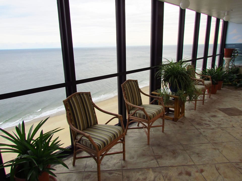 Floor to ceiling windows hall to gym locker room pool sauna game and sun room !!