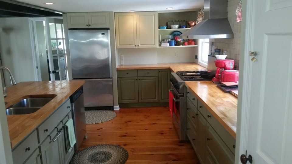 Kitchen w 6 burner chef stove and dishwsher
