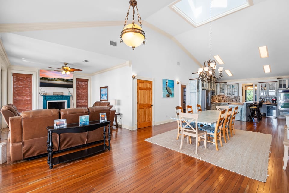 Open concept kitchen, dining, and living spaces all have spectacular views.