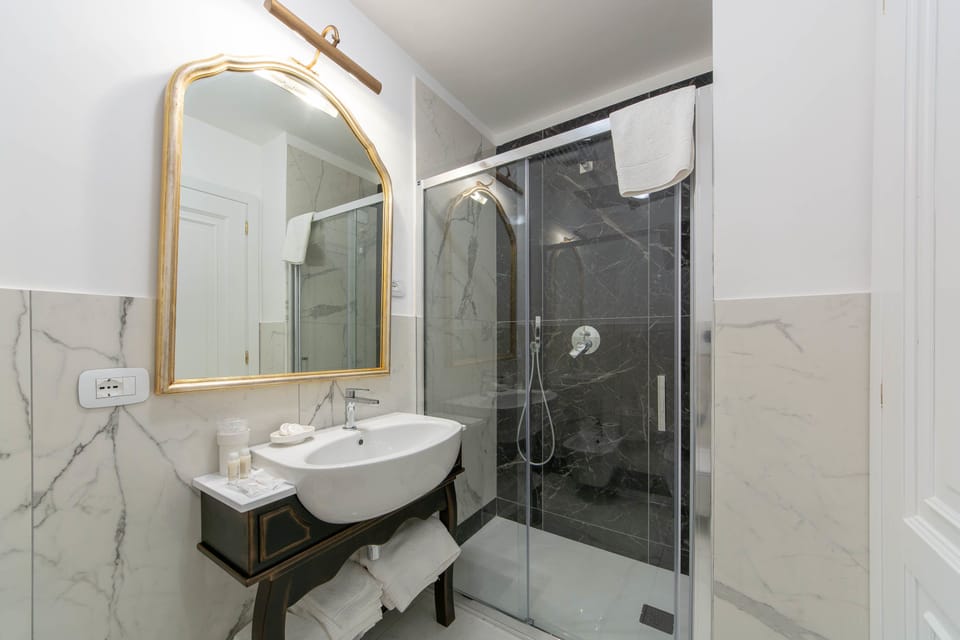 Shower, free toiletries, hair dryer, bathrobes