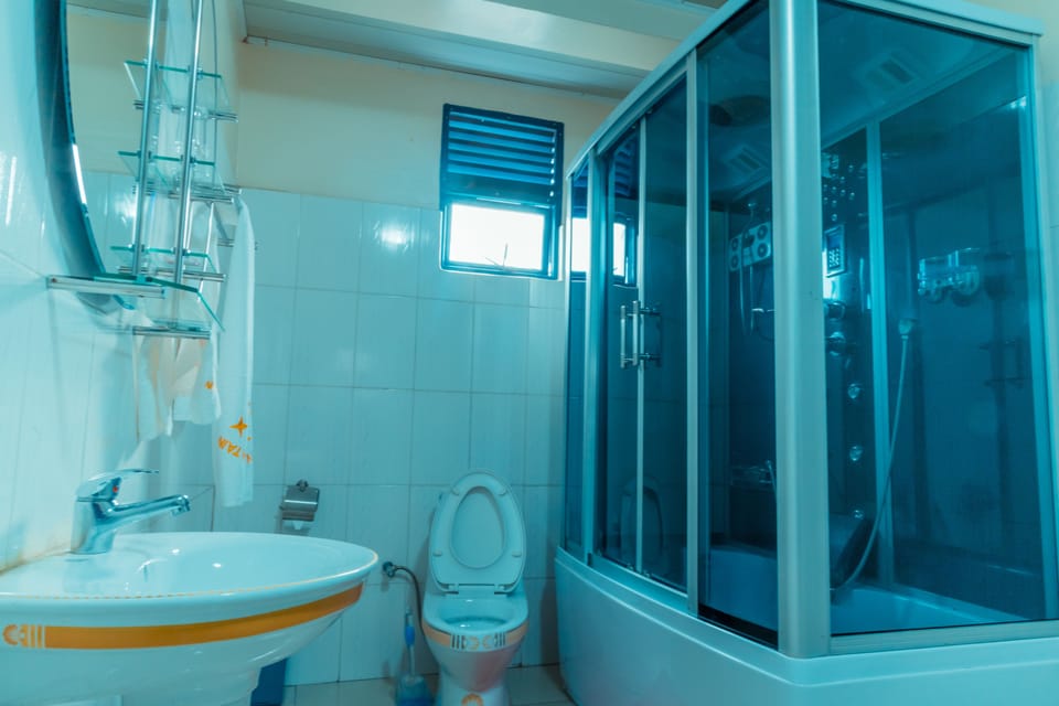 Apartment, 2 Bedrooms | Bathroom | Shower, free toiletries, hair dryer, towels