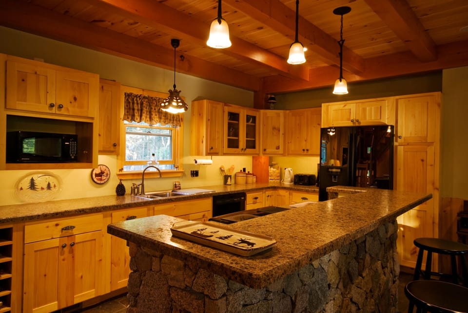 Gourmet kitchen with custom breakfast bar!