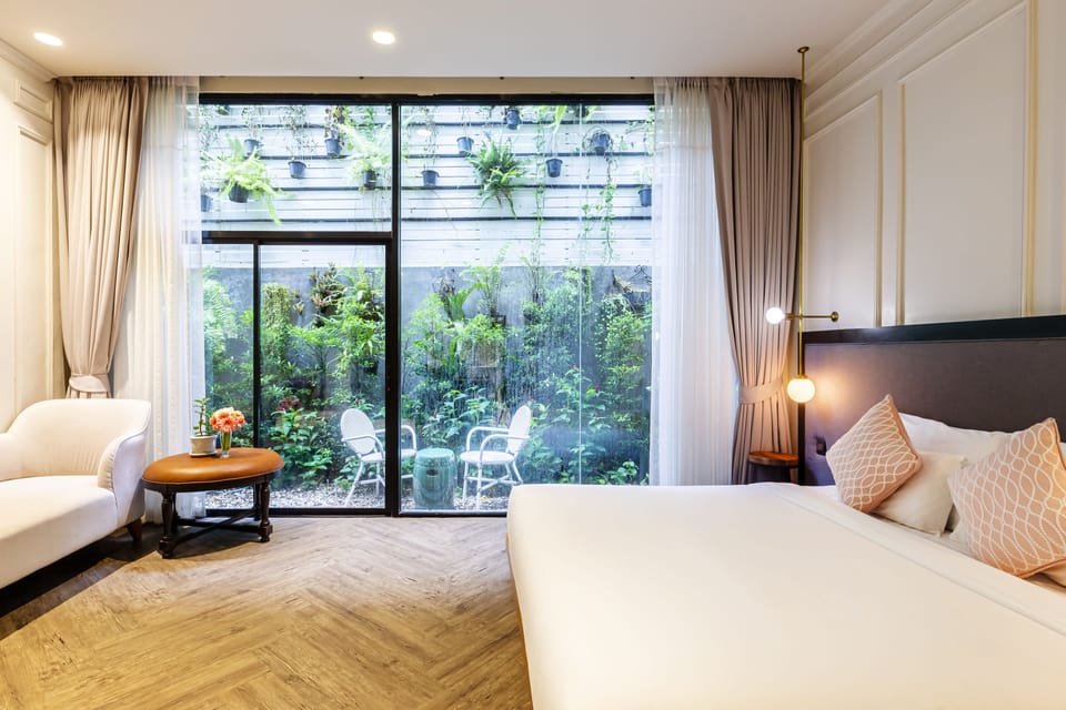 Deluxe Room, Garden View | Premium bedding, minibar, blackout drapes, free WiFi