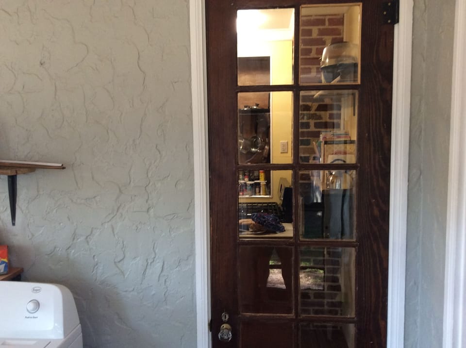 French door opens from laundry to kitchen