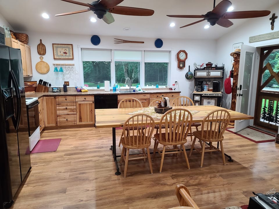 Fully equipped kitchen with side-by-side refrigerator,  stove, and dishwasher!