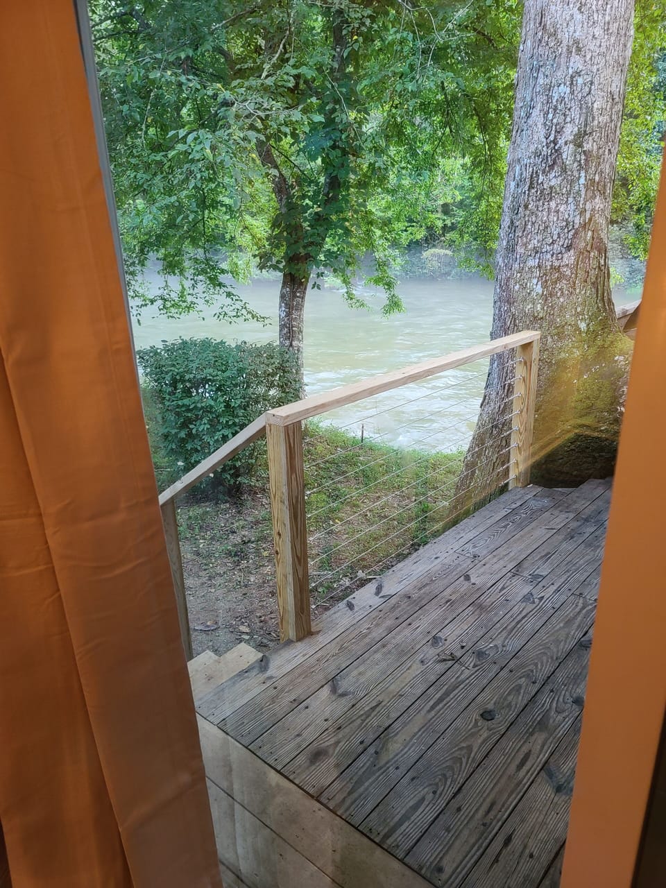 View from Master bedroom sliding glass door towards the Nottely River.