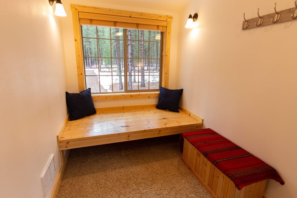 Room to relax by the window and listen to the wind in the trees.