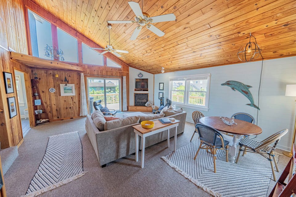 Family room with game table and games.