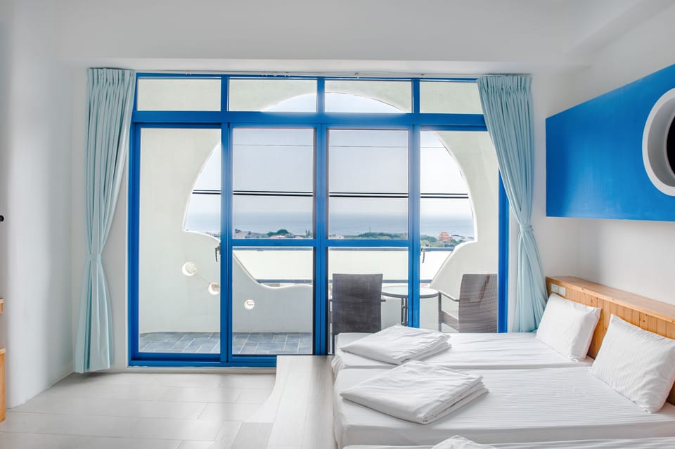 Standard Quadruple Room, Ocean View | Soundproofing, free WiFi, bed sheets