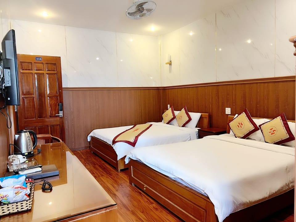 Standard Quadruple Room | 1 bedroom, minibar, in-room safe, desk