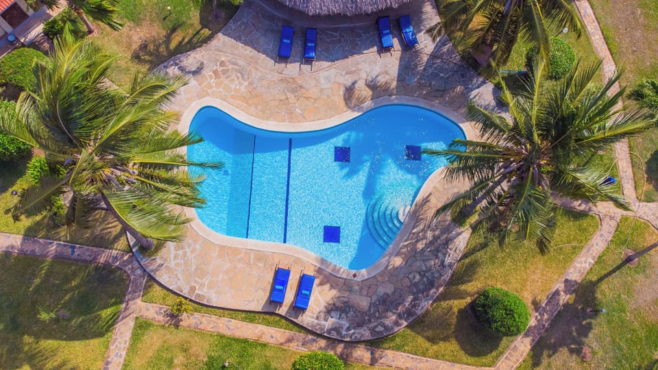 Outdoor pool, open 10 AM to 6:30 PM, sun loungers