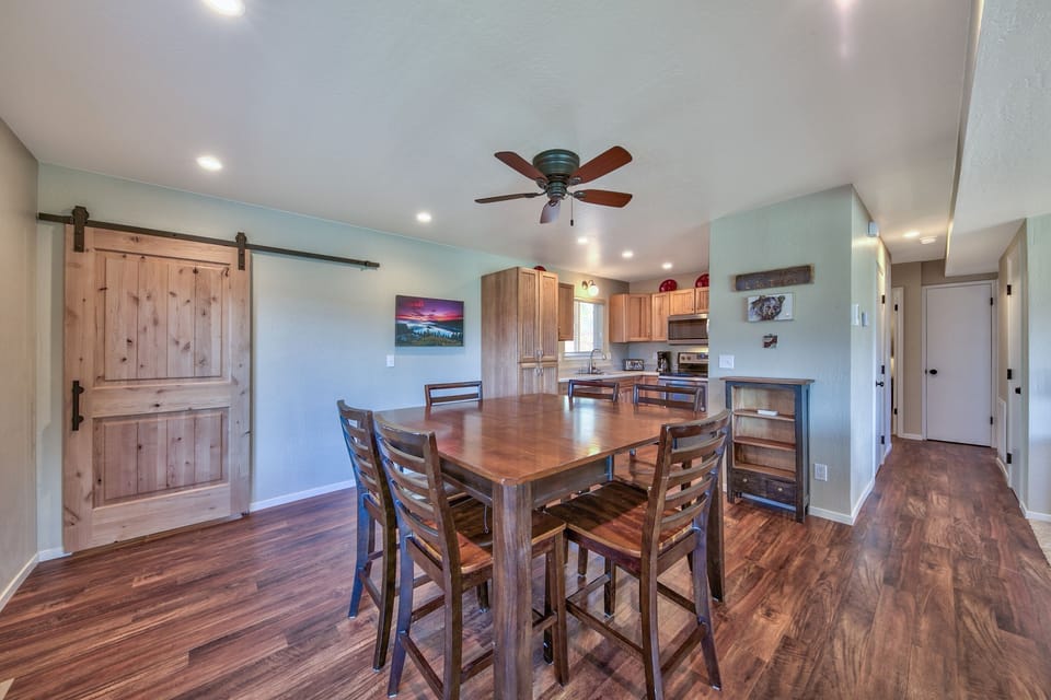 This high dining table looks great, seats the whole fam (8 total), and is perfect for eating a meal or playing cards