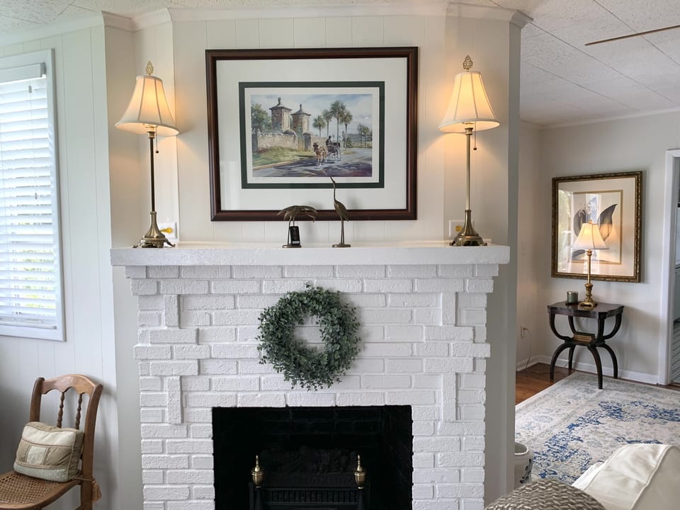 Fireplace has electric logs