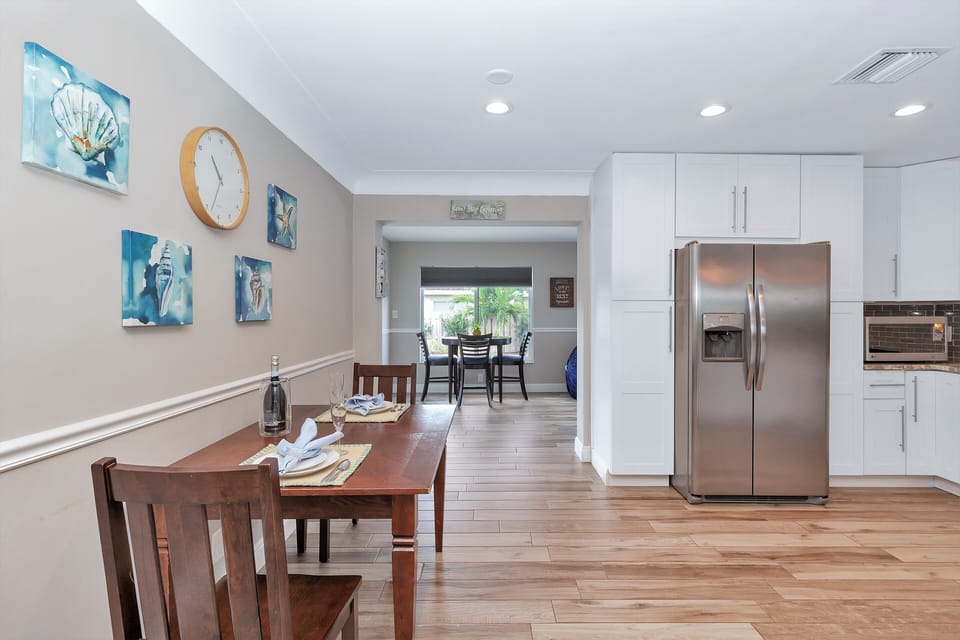 Custom Kitchen, Bar and Dining Area for Meals and Entertainment
