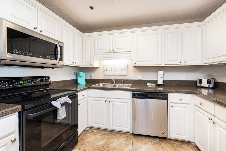 Quiet moments in this kitchen let you prep snacks while the dishwasher hums softly nearby
