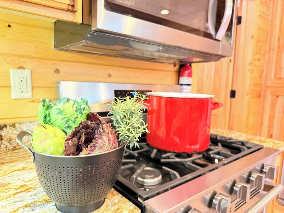 A chef's delight! Whip up hearty family meals on the premium stainless steel gas range, completely stocked with quality cookware and essentials.