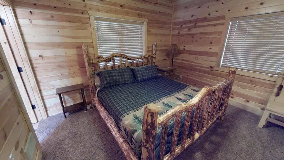 Master bedroom located on the main floor with a King size bed.