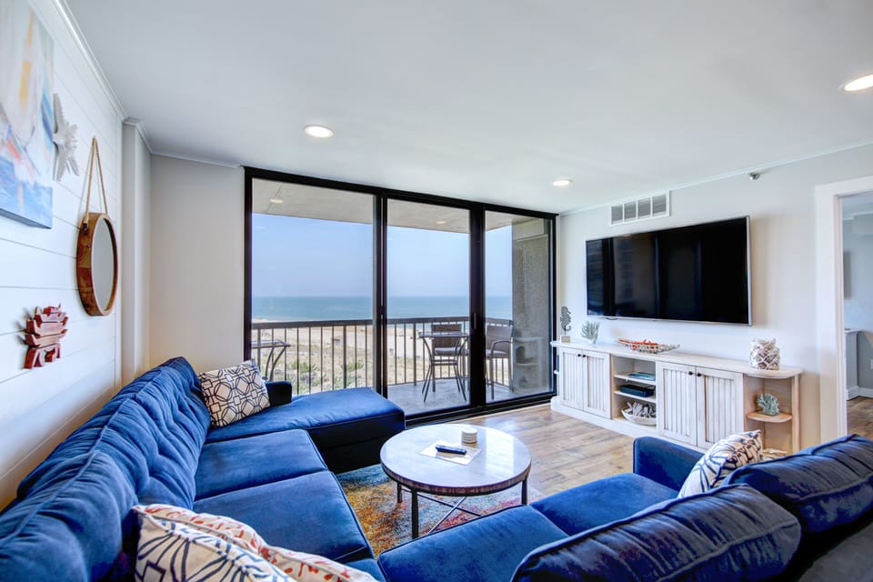 Family Room with 72" TV, Comcast Cable/WiFI, board games in the TV console.