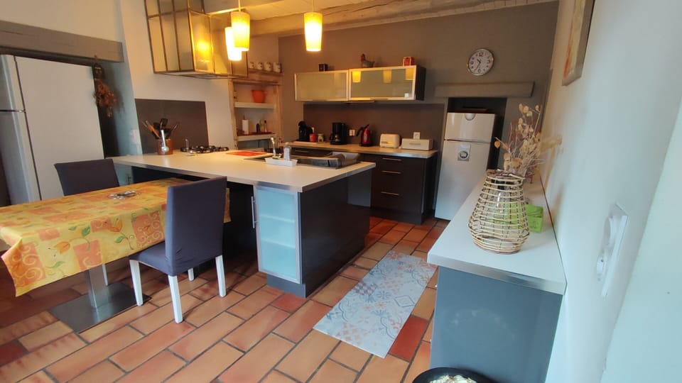 Comfort House, Private Bathroom, Courtyard View (Mas piscine ,boulodrome) | Private kitchen | Highchair