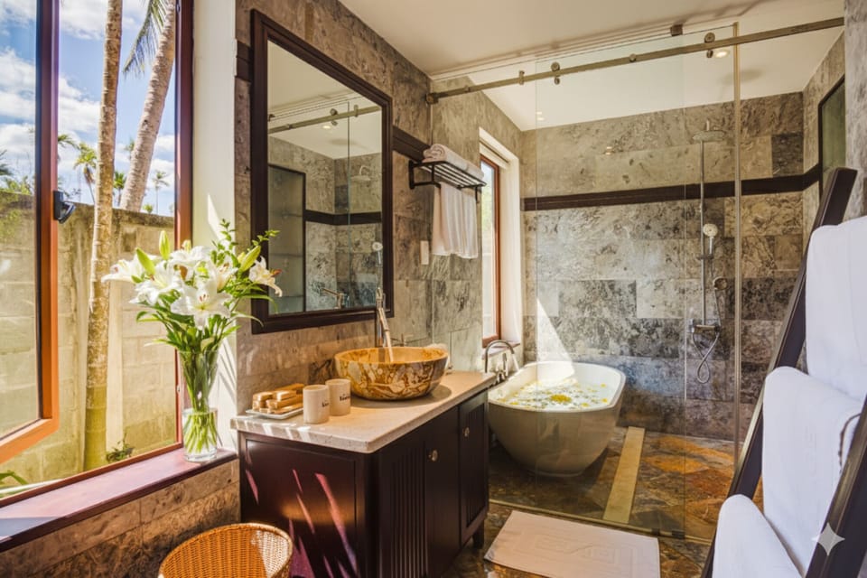 Family Room, Pool View | Bathroom | Combined shower/tub, rainfall showerhead, free toiletries, hair dryer