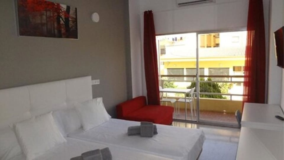 Double Room with Air Conditioning, and Terrace | Desk, blackout drapes, iron/ironing board, free WiFi